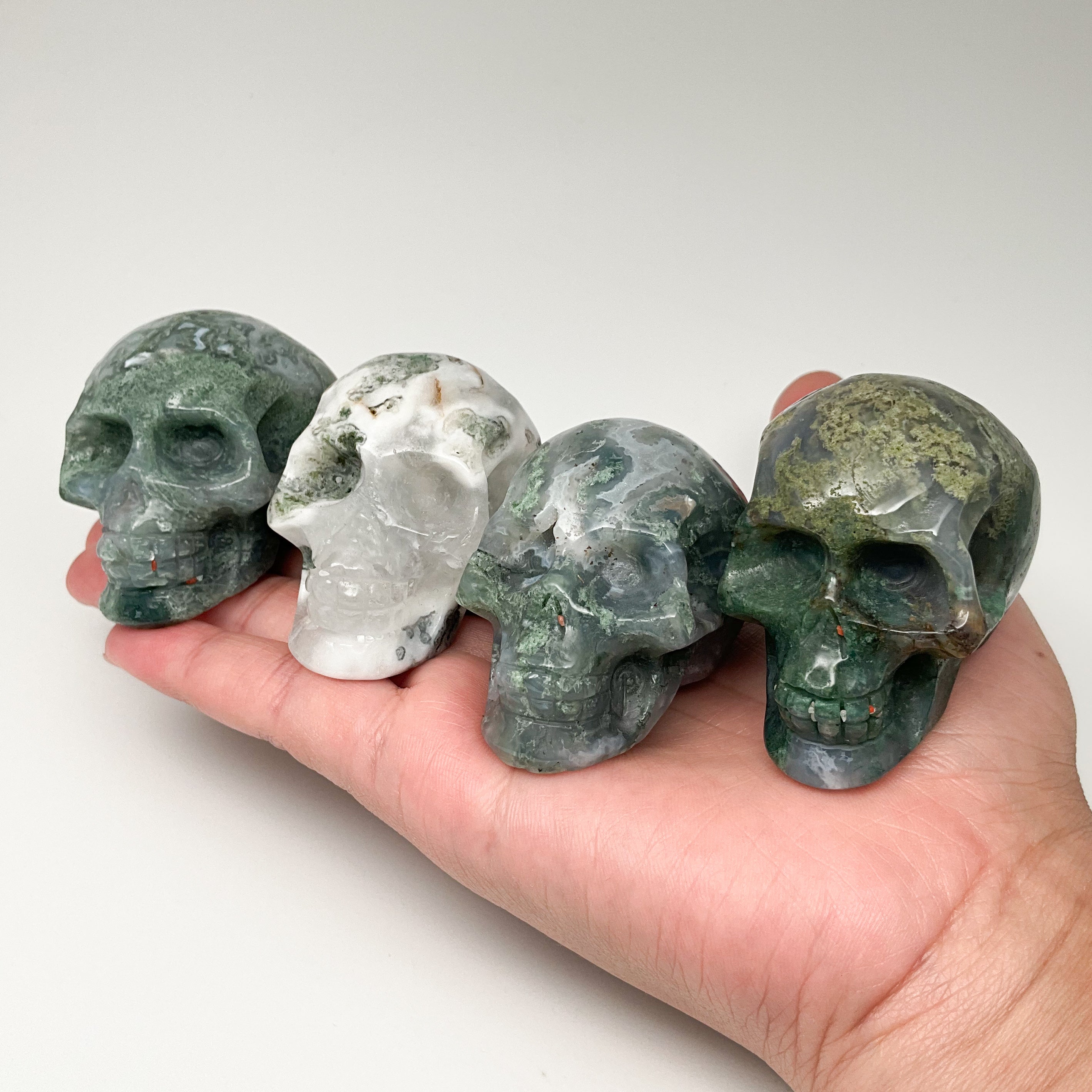 Moss agate skull offers