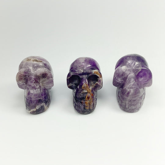 Carved Chevron Amethyst Skull at $69 Each