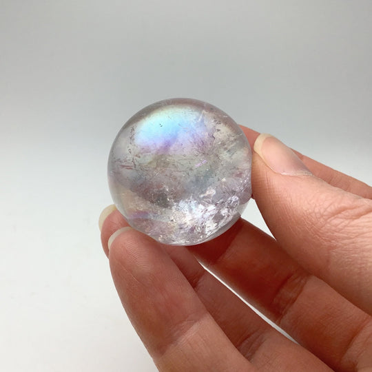 Opalescent Aura Quartz Sphere at $69 Each