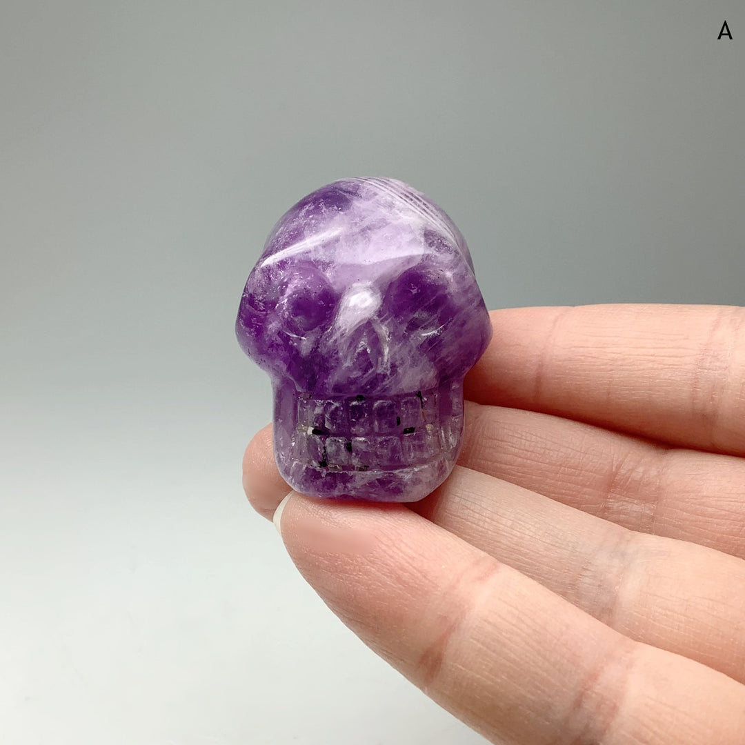 Carved Chevron Amethyst Skull at $49 Each