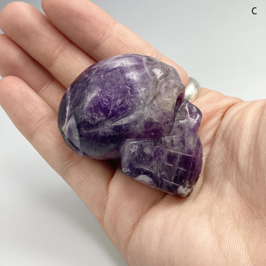 Carved Chevron Amethyst Skull at $69 Each