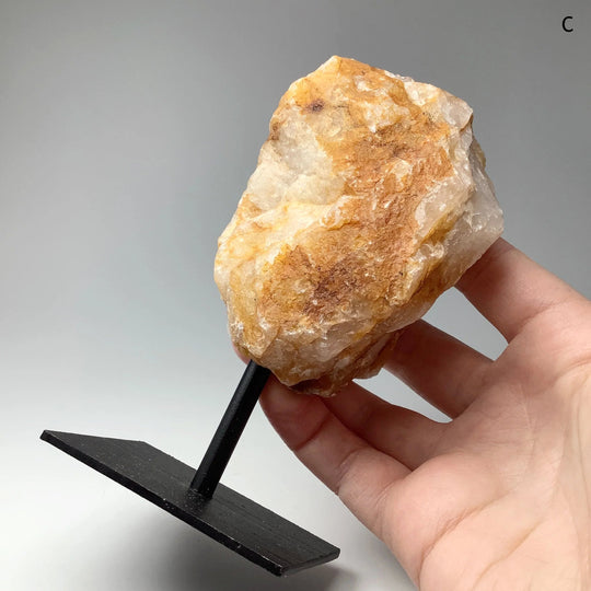 Golden Healing Quartz On Metal Display Stand