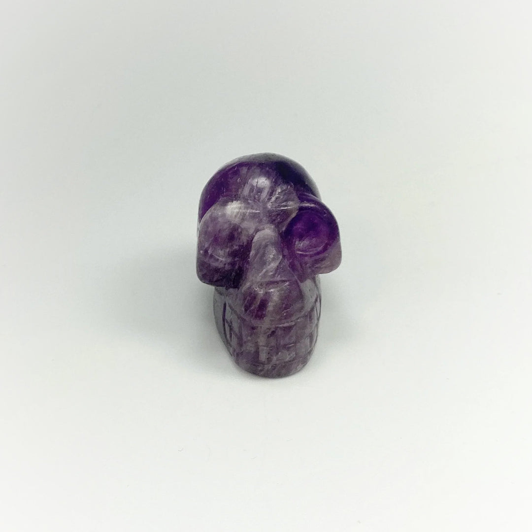 Carved Chevron Amethyst Skull at $69 Each