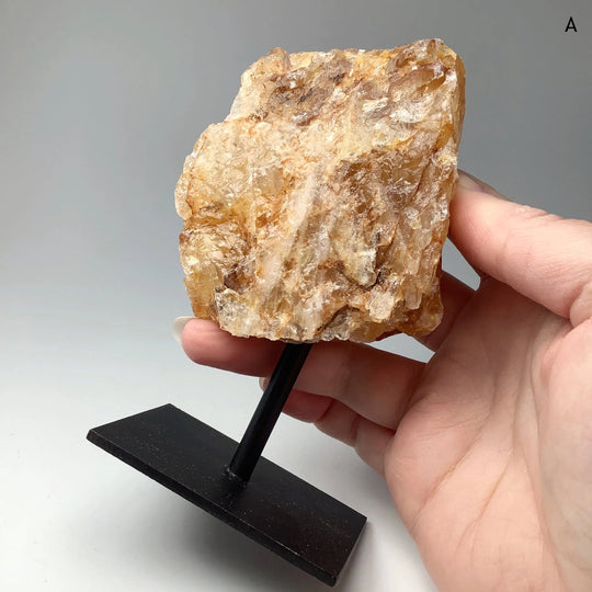 Golden Healing Quartz On Metal Display Stand