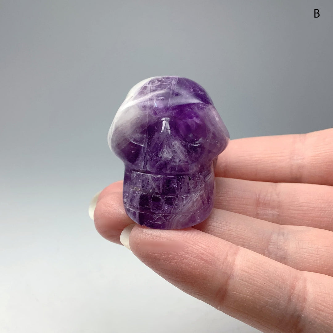 Carved Chevron Amethyst Skull at $49 Each