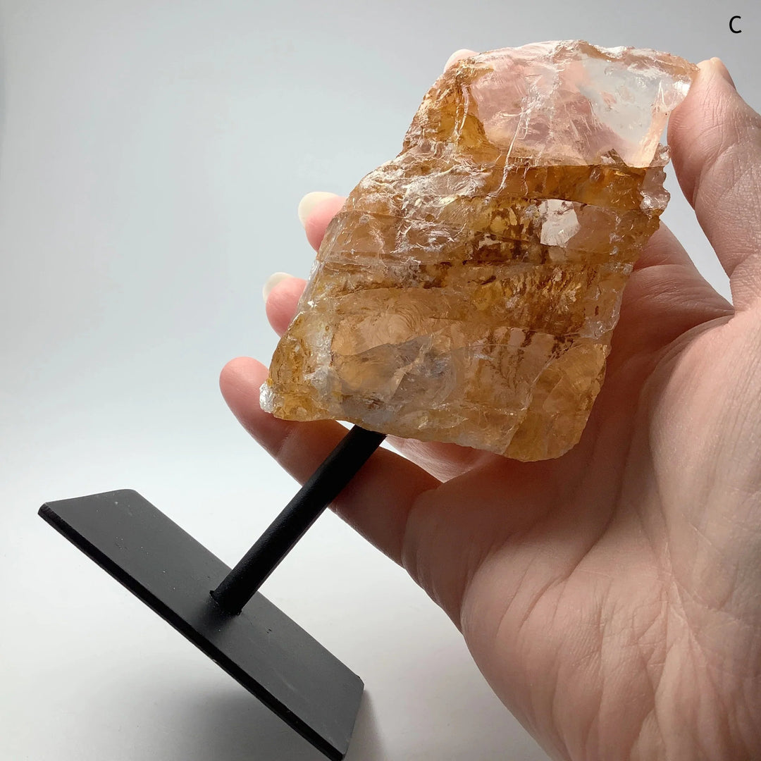 Golden Healing Quartz On Metal Display Stand