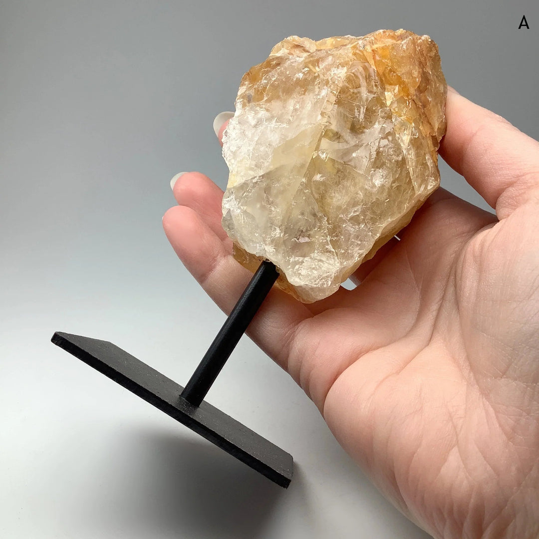 Golden Healing Quartz On Metal Display Stand