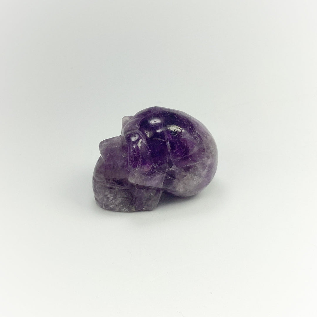 Carved Chevron Amethyst Skull at $69 Each