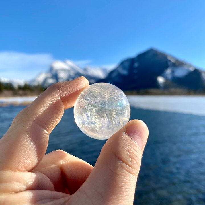 Opalescent Aura Quartz Sphere at $79 Each