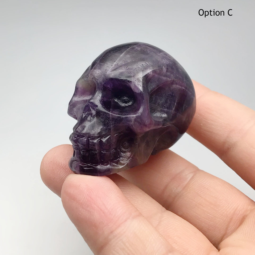 Carved Chevron Amethyst Skull at $85 Each