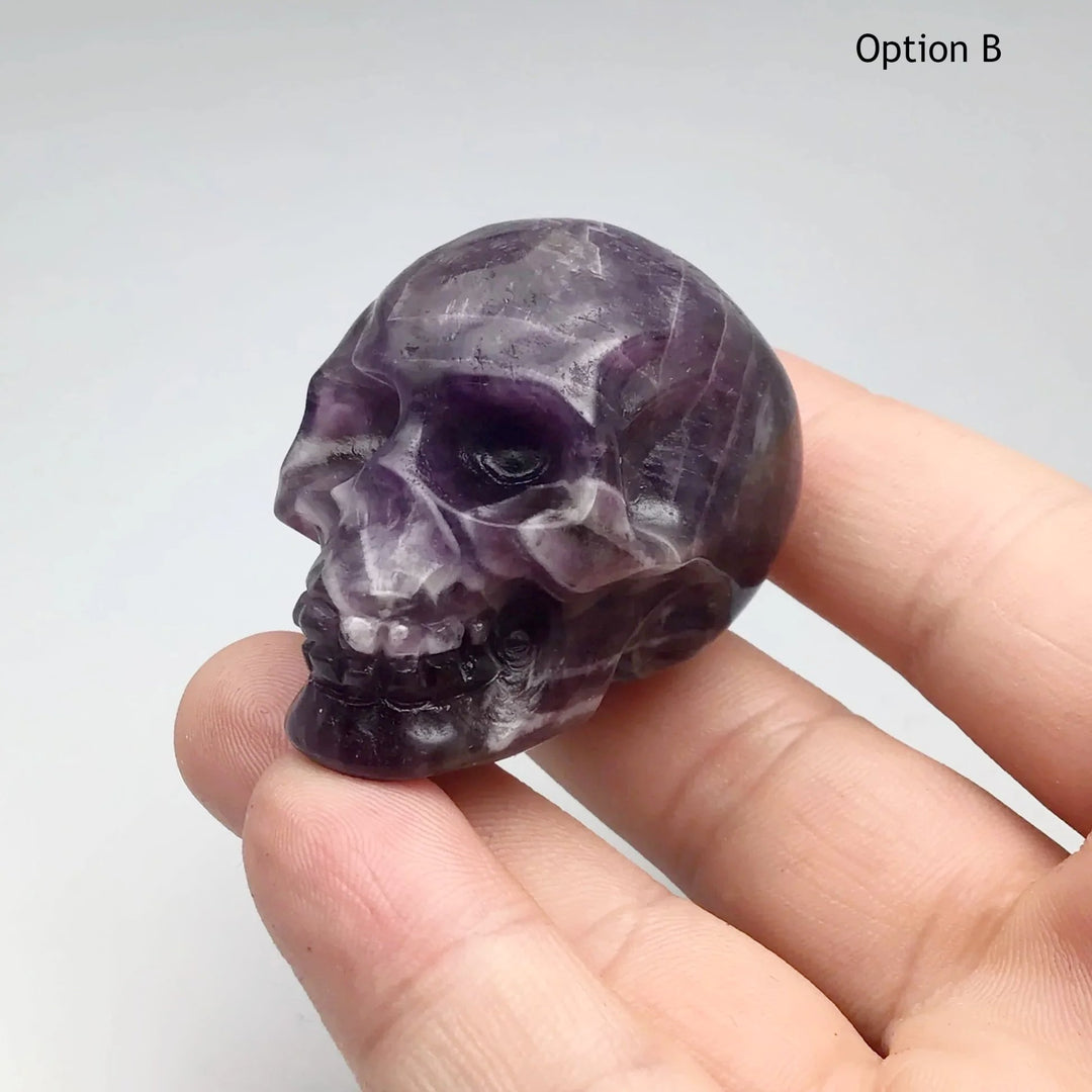 Carved Chevron Amethyst Skull at $85 Each