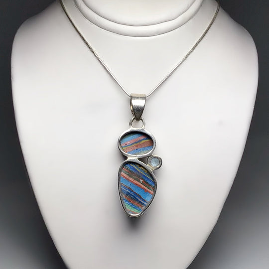 Rainbow Calcite and Blue Topaz Pendant