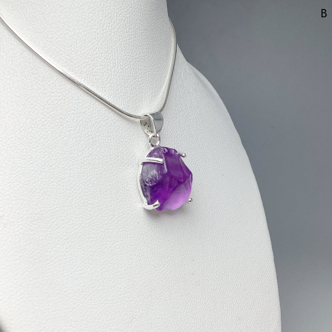 Raw Amethyst Pendant at $139 Each