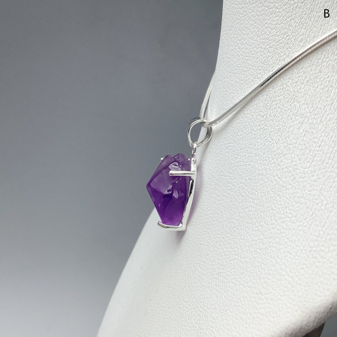 Raw Amethyst Pendant at $139 Each