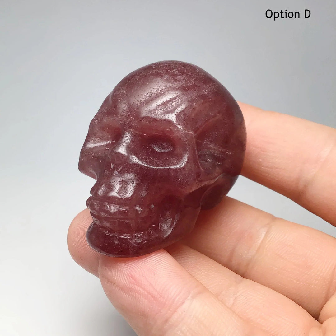 Carved Strawberry Quartz Skull at $69 Each