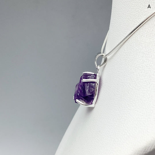 Raw Amethyst Pendant at $139 Each