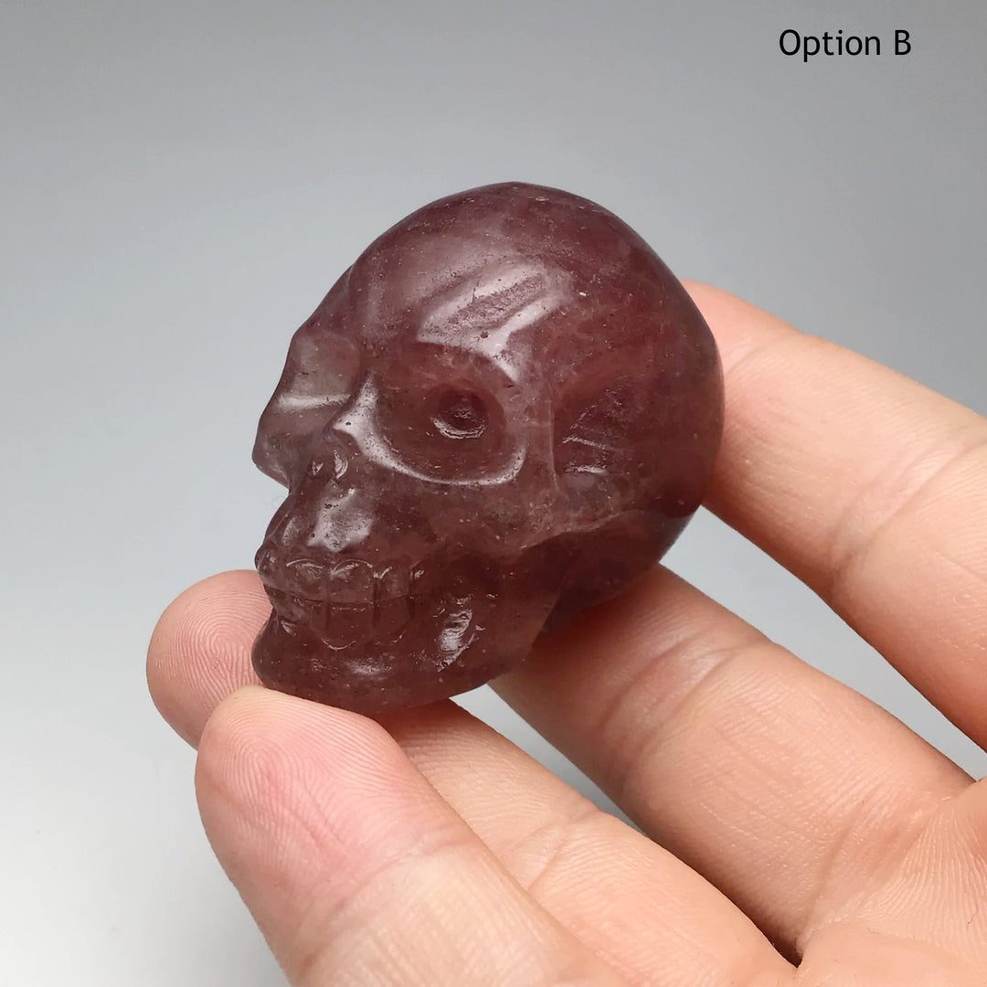 Carved Strawberry Quartz Skull at $69 Each