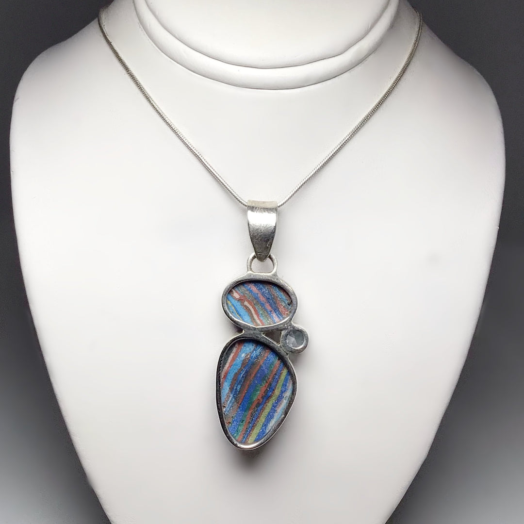 Rainbow Calcite and Blue Topaz Pendant