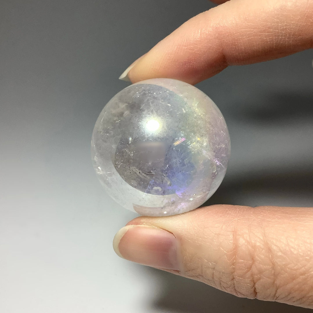 Opalescent Aura Quartz Sphere at $79 Each