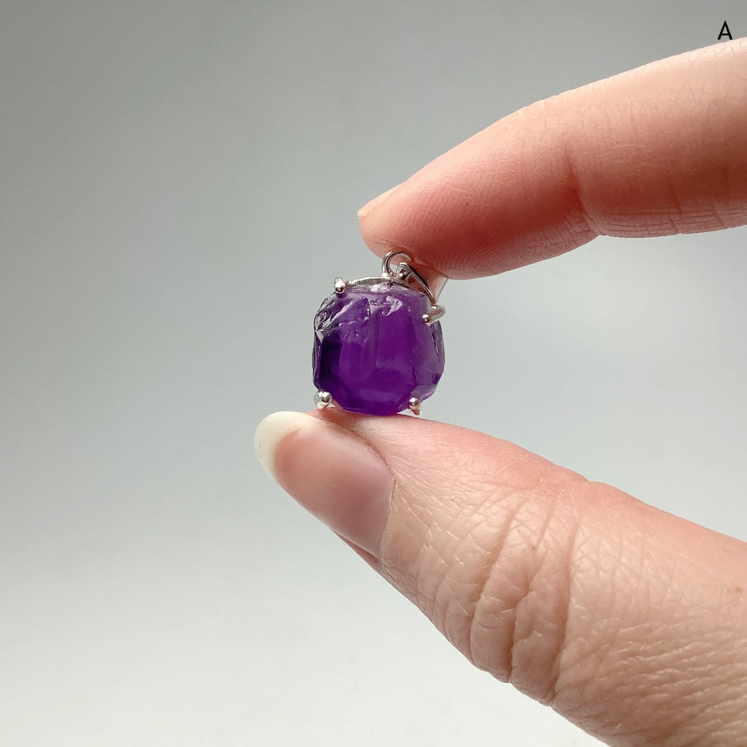 Raw Amethyst Pendant at $139 Each