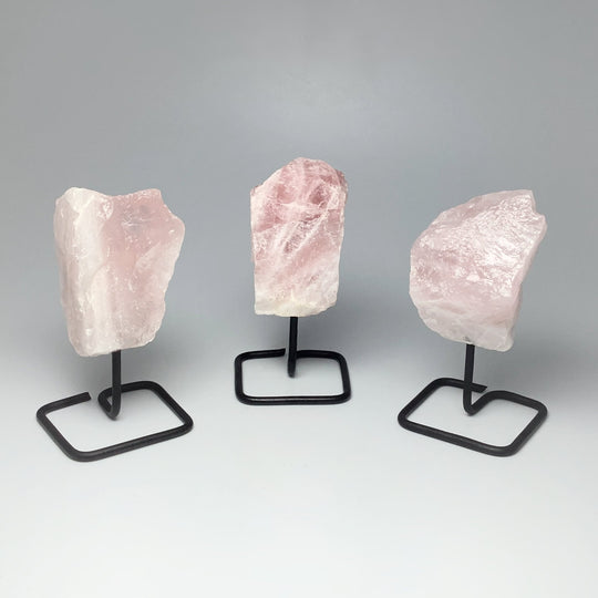 Rough Rose Quartz on Stand at $25 Each