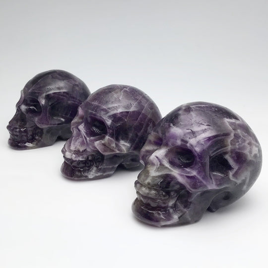 Carved Chevron Amethyst Skull at $85 Each