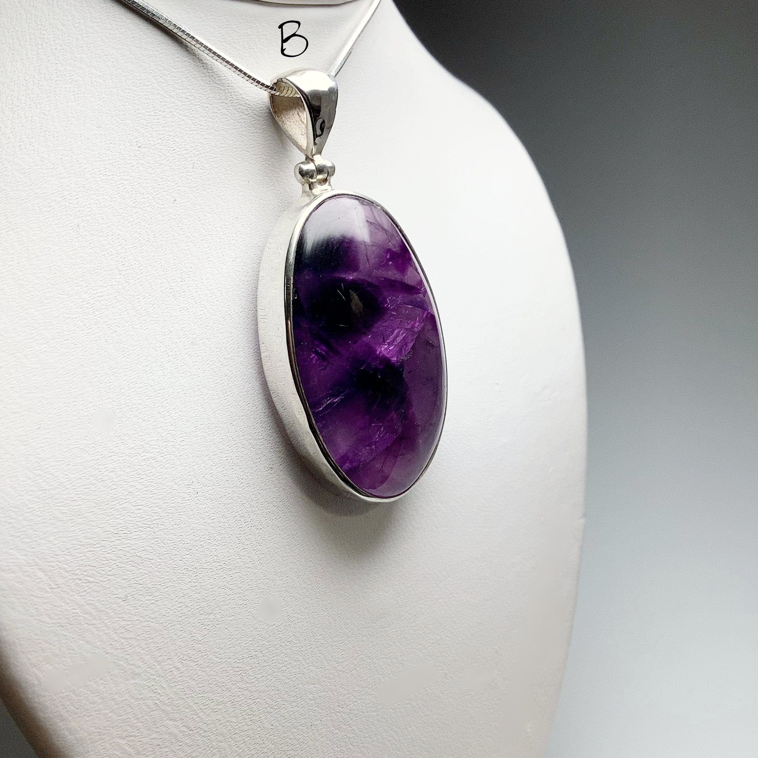 Larvikite, 2024 Amethyst, Quartz & Rune pendant