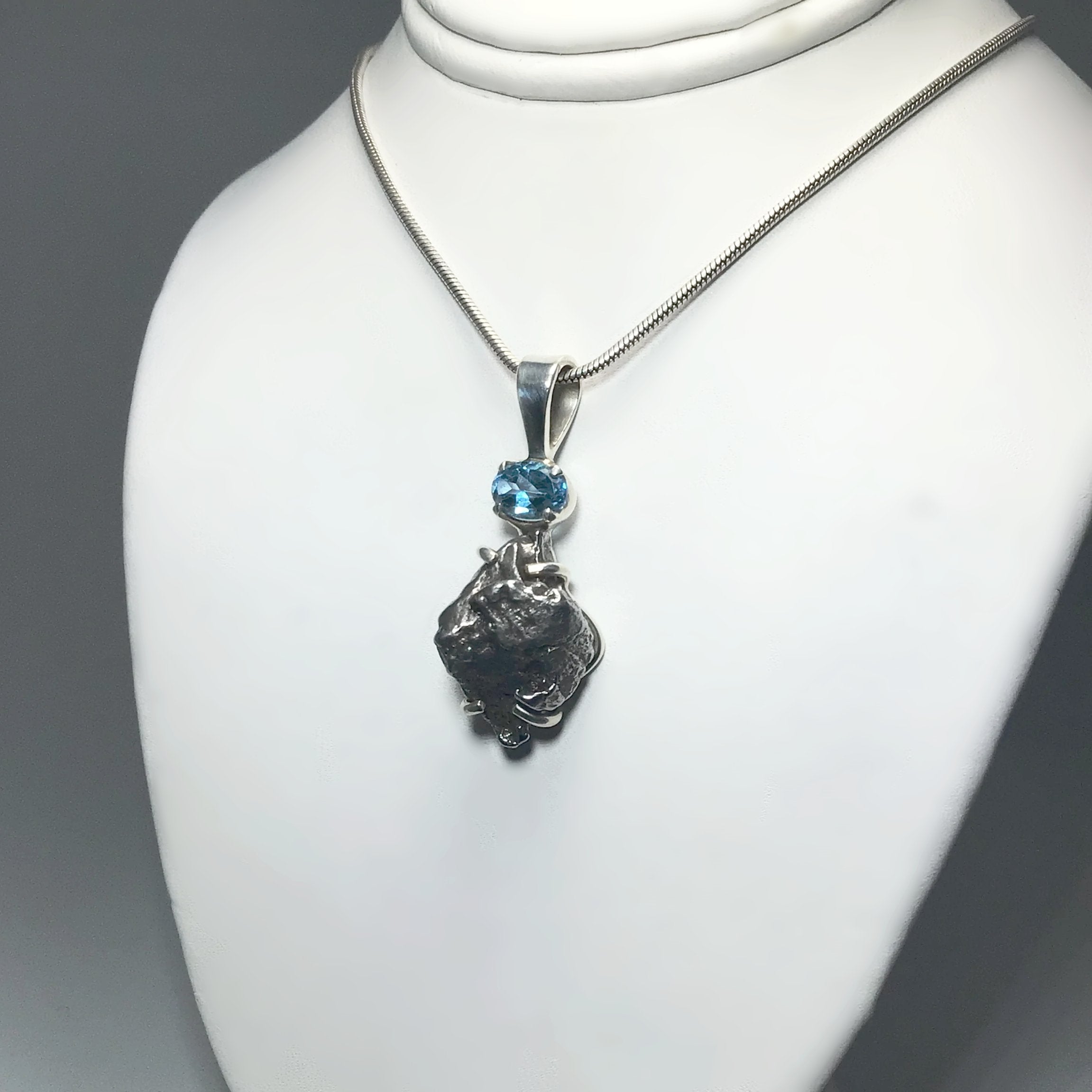 Campo Del Cielo Meteorite and Faceted Blue Topaz Pendant