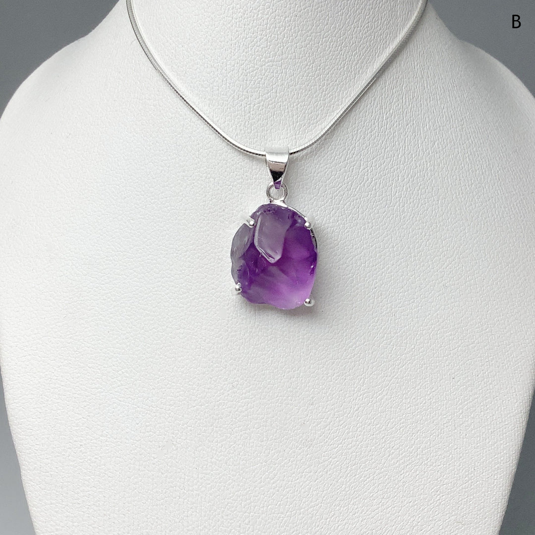 Raw Amethyst Pendant at $139 Each