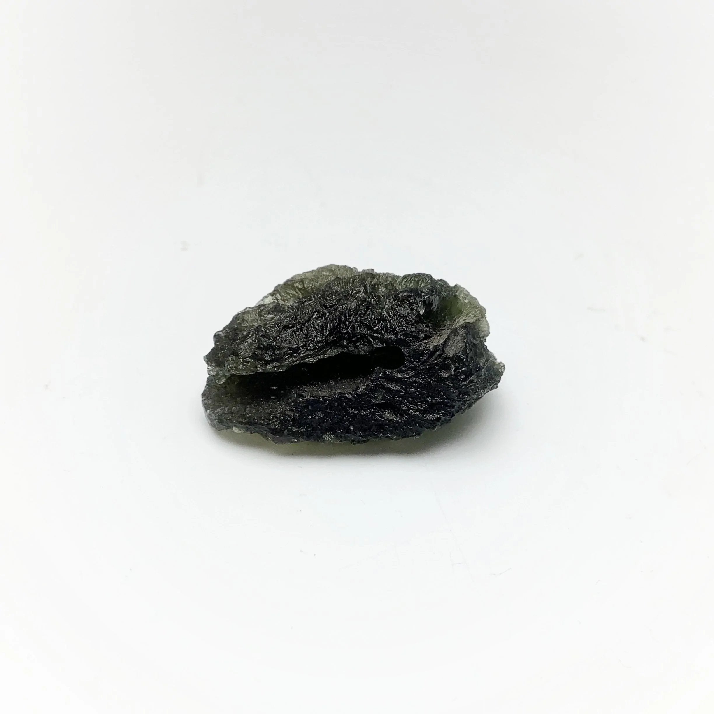 Moldavite mineral specimen, crystal specimen. top